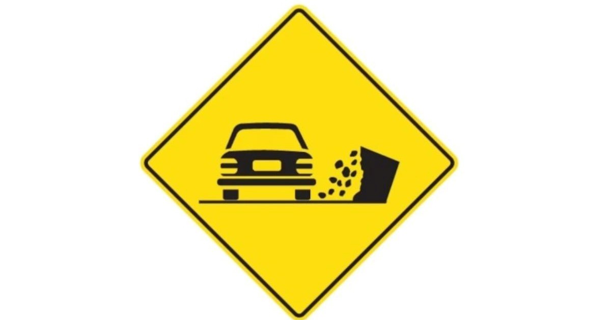 Qué significa esta señal de tránsito amarilla con un auto y piedras al costado